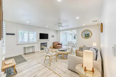 a living room with a couch and a table at Slide Creek Retreat in Bass Lake