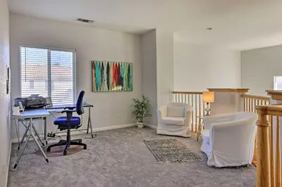 an office with a desk and chairs and a table at Family-Friendly Modesto Home with Grill and Yard in Modesto