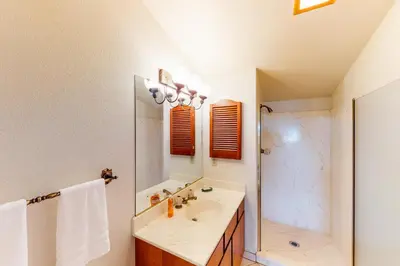 a bathroom with a sink and a shower at Tahoe Enchantment in Zephyr Cove