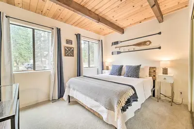 a bedroom with a bed and a window at 2 Mi to Tahoe Donner Ski Resort Forest-View Haven in Truckee