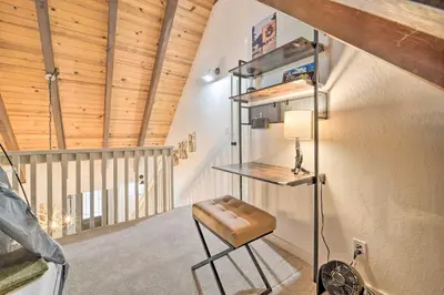 a stool in the corner of a room with a wooden ceiling at 2 Mi to Tahoe Donner Ski Resort Forest-View Haven in Truckee