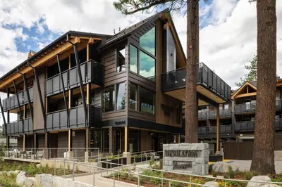 an exterior view of a building with large windows at Desolation Hotel in South Lake Tahoe
