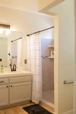 a bathroom with a shower and a sink at Gateway Retreat: Short Drive to the Sequoias in Exeter