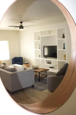 a living room with a couch and a table at Gateway Retreat: Short Drive to the Sequoias in Exeter