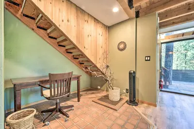 a home office with a desk and a staircase at Hot Tub and Ski Shuttle Northstar Resort House in Truckee