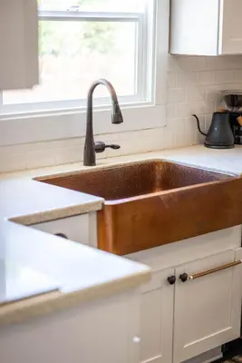 a kitchen with a copper sink and a window at 738 E Yale in Fresno