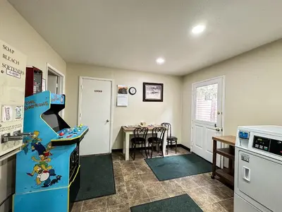 a kitchen with a blue refrigerator and a table at La Vista Blanc #59 condo in Mammoth Lakes