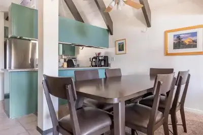 a dining room with a table and chairs at Perfect Ski Rental 2 blocks from Village Gondola in Mammoth Lakes