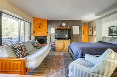 a living room with a bed and a couch at Cozy Mammoth Lakes Studio 5 Mi to Ski Slopes in Mammoth Lakes