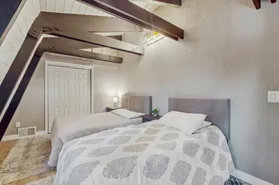 a bedroom with two beds in a room at Sierra Nevada Serenity in South Lake Tahoe