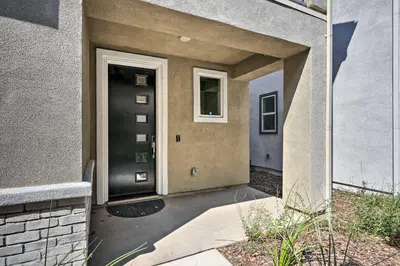 a front door of a house with a door at Pet-Friendly Elk Grove Retreat with Balcony! in Elk Grove