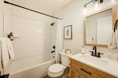 a white bathroom with a sink and a toilet at Incline Village Stunner in Incline Village