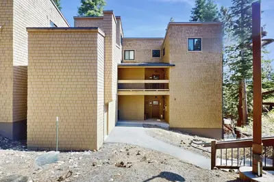 an exterior view of a large brick building at Coyote Fork Escape in Truckee