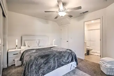 a bedroom with a bed and a ceiling fan at Contemporary Los Banos Studio Less Than 3 Mi to Dtwn! in Los Banos