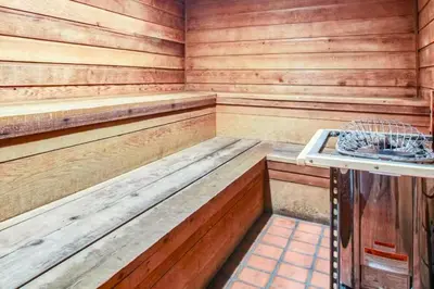 a sauna with a bench and a basket in it at Snowcreek 56 in Mammoth Lakes