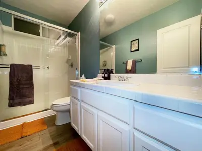 a bathroom with a sink and a toilet and a shower at King Bed Quiet Home on Cul-de-Sac Hiking Trails in Roseville