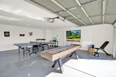 a ping pong room with two ping pong tables at Villa near Yosemite & bass lake w/Hot Tub/EVcharge in Oakhurst