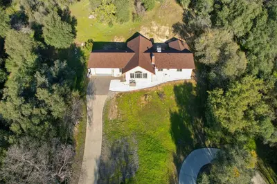an overhead view of a house with a roof at Villa near Yosemite & bass lake w/Hot Tub/EVcharge in Oakhurst