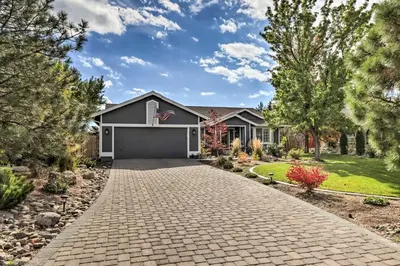 a driveway leading to a house with a garage at Hot Tub and Fire Pit Reno Gem 12 Mi to Skiing in Reno