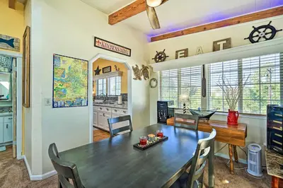 a kitchen and dining room with a table and chairs at Bethel Island Retreat with Private Boat Slip! in Bethel Island