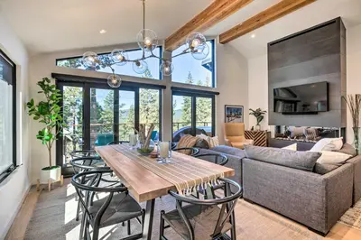 a dining room and living room with a table and chairs at Hot Tub! Family Home 7 Mi to Diamond Peak Resort in Kings Beach