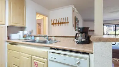 a kitchen with a sink and a counter top at Summit #105 condo in Mammoth Lakes