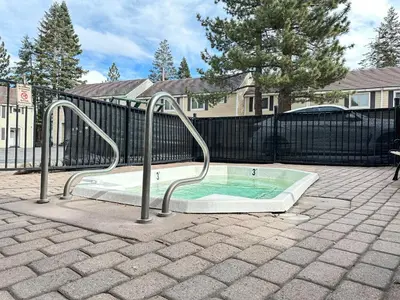 a small swimming pool with two handles in a yard at Lakeview Villas #28 condo in Mammoth Lakes