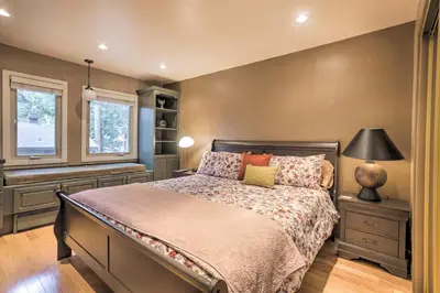 a bedroom with a bed and a window at 3 Mi to Skiing! Incline Village Retreat with Sauna in Incline Village
