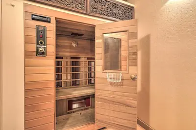 a walk in closet in a home with wood paneling at 3 Mi to Skiing! Incline Village Retreat with Sauna in Incline Village
