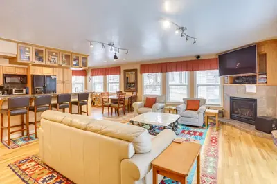 a living room with a couch and a fireplace at 3 Mi to Skiing! Incline Village Retreat with Sauna in Incline Village