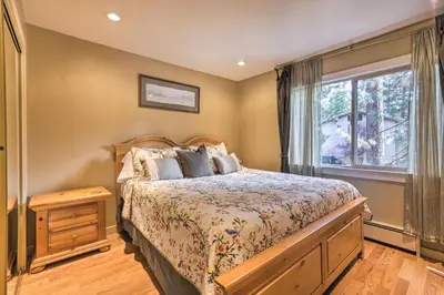 a bedroom with a bed and a window at 3 Mi to Skiing! Incline Village Retreat with Sauna in Incline Village