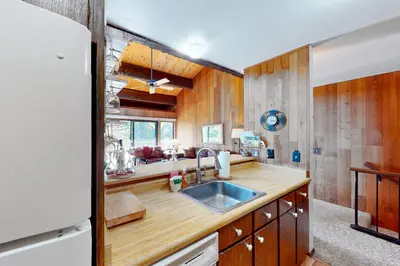a kitchen with a sink and a counter top at Kings Beach Cozy in Kings Beach