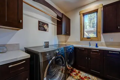 a kitchen with a washing machine in a kitchen at Sierra Vista in Truckee