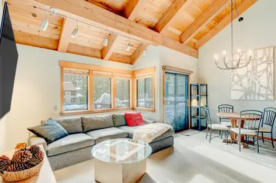 a living room with a couch and a table at Granlibakken Getaway - #72A in Tahoe City