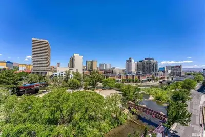 a view of a city with a river and buildings at Panorama Place in Reno