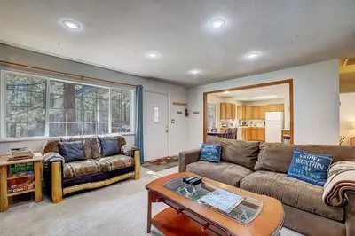a living room with a couch and a table at 1763 Saponi Street home in South Lake Tahoe