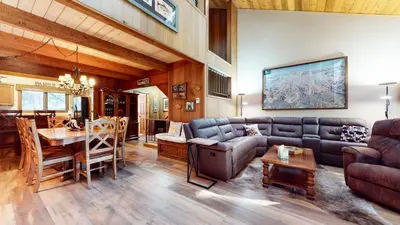 a living room with a couch and a table at Winterset #3 condo in Mammoth Lakes