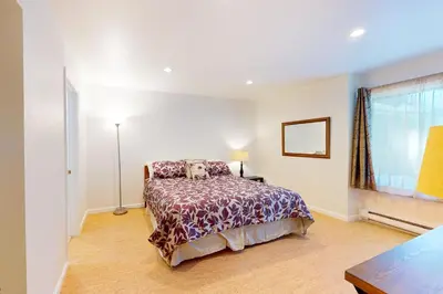 a bedroom with a bed and a window at Horizons 4 179 in Mammoth Lakes