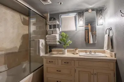 a bathroom with a sink and a shower at Bridges 112 in Mammoth Lakes