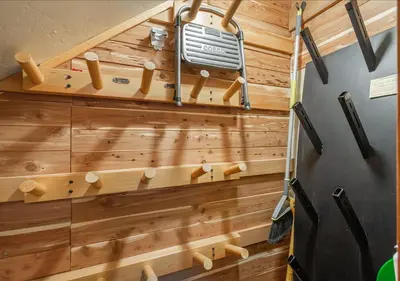 a sauna with wood paneling and a wall with hockey sticks at Cozy Northstar Village Family Condo Walk to Lifts 2 Full BA Excellent Location in Truckee