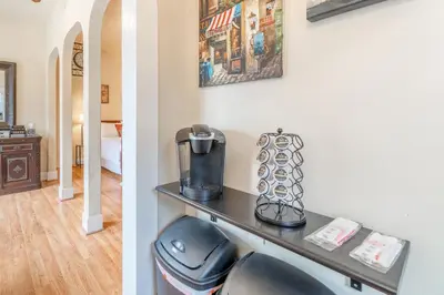 a room with a table with a coffee maker on it at Rustic Studio walking distance to Downtown in Reno
