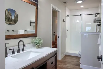 a bathroom with a sink and a shower at NEW! Yosemite Mountain villa, stunning views -more in Oakhurst