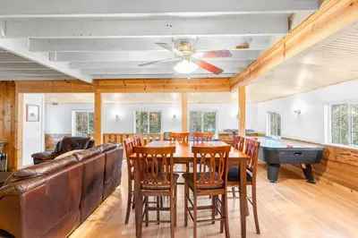 a dining room with a table and ping pong ball at Vacation Valhalla in Arnold