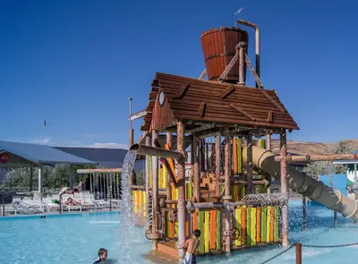 a water park with a water slide in a pool at Reno Gem 3 and a half Miles to DT, 40 Miles to Tahoe in Reno