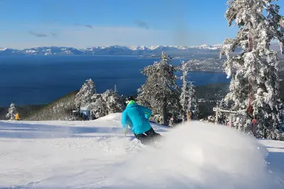 a person is skiing down a snow covered slope at Fairway Forest in Incline Village