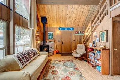 a living room of a tiny house with a couch at Lofty Lodi in South Lake Tahoe