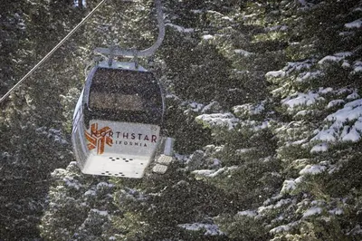 a ski lift in the snow on a mountain at Evergreen Escape in Truckee