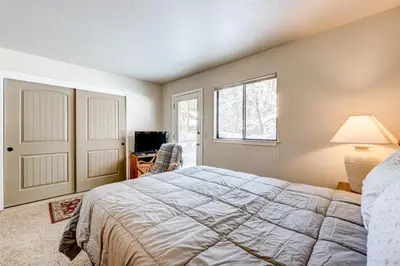 a bedroom with a bed and a window at Lakeview Serenity in Incline Village