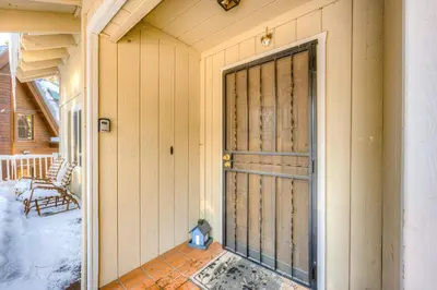 a front door of a house with snow on the porch at Lakeview Serenity in Incline Village
