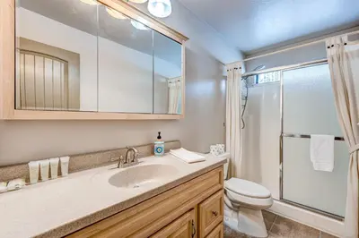 a bathroom with a sink and a toilet and a shower at Lakeview Serenity in Incline Village